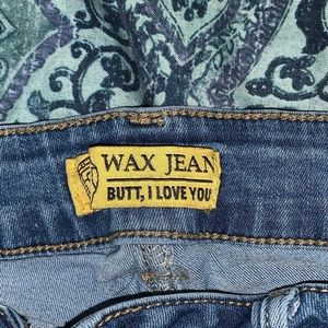 light blue, small, high waisted Jean shorts.